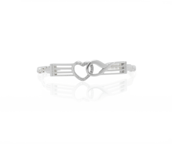 A sterling silver bracelet featuring a polished bar clasp and a central pavé cubic zirconia heart-shaped hook on a fine silver chain.