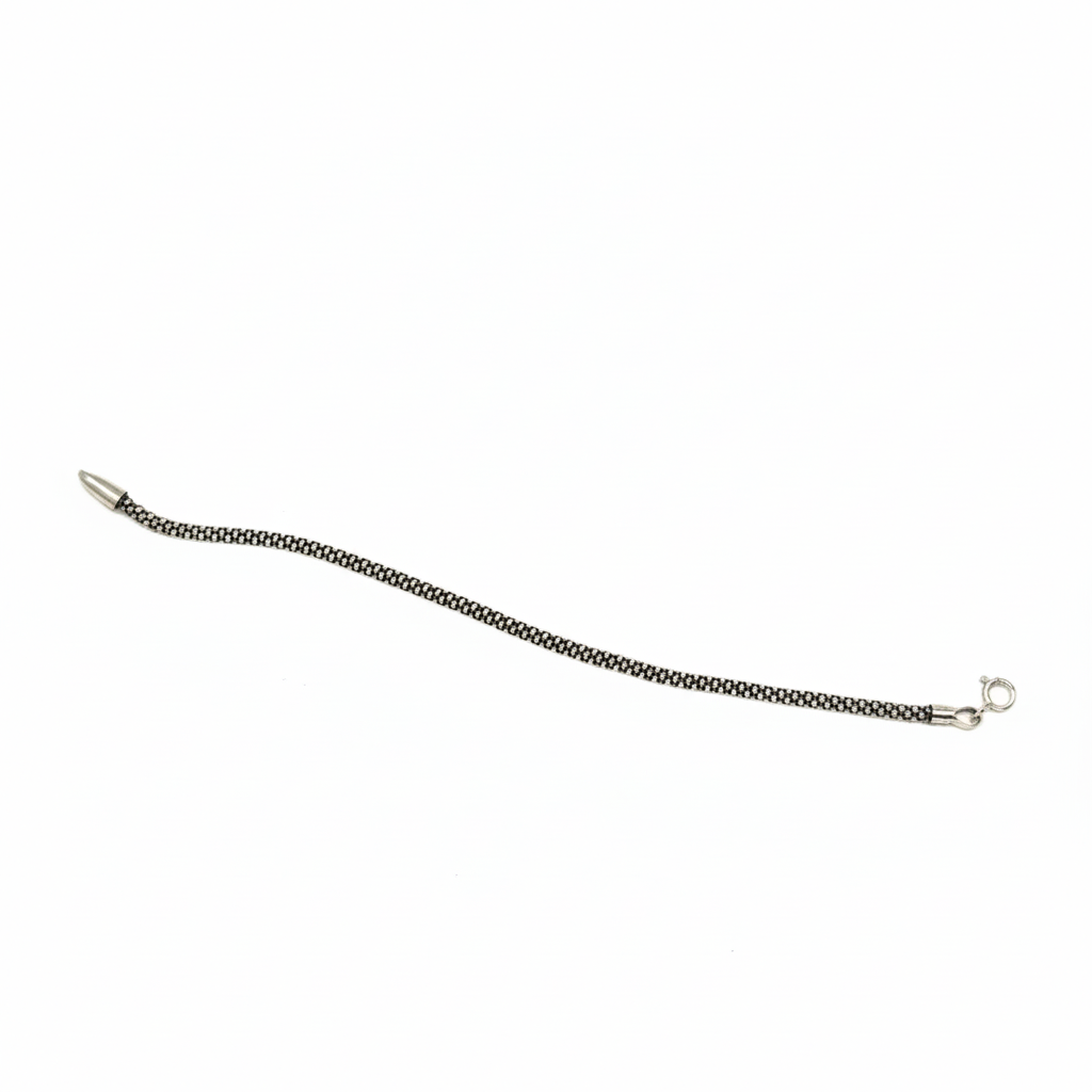 Madhisha Silvers sleek woven sterling silver bracelet, fluid foxtail pattern chain.
