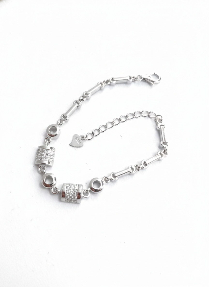 Icon Duo Link silver bracelet featuring bar links and zircon studded charms