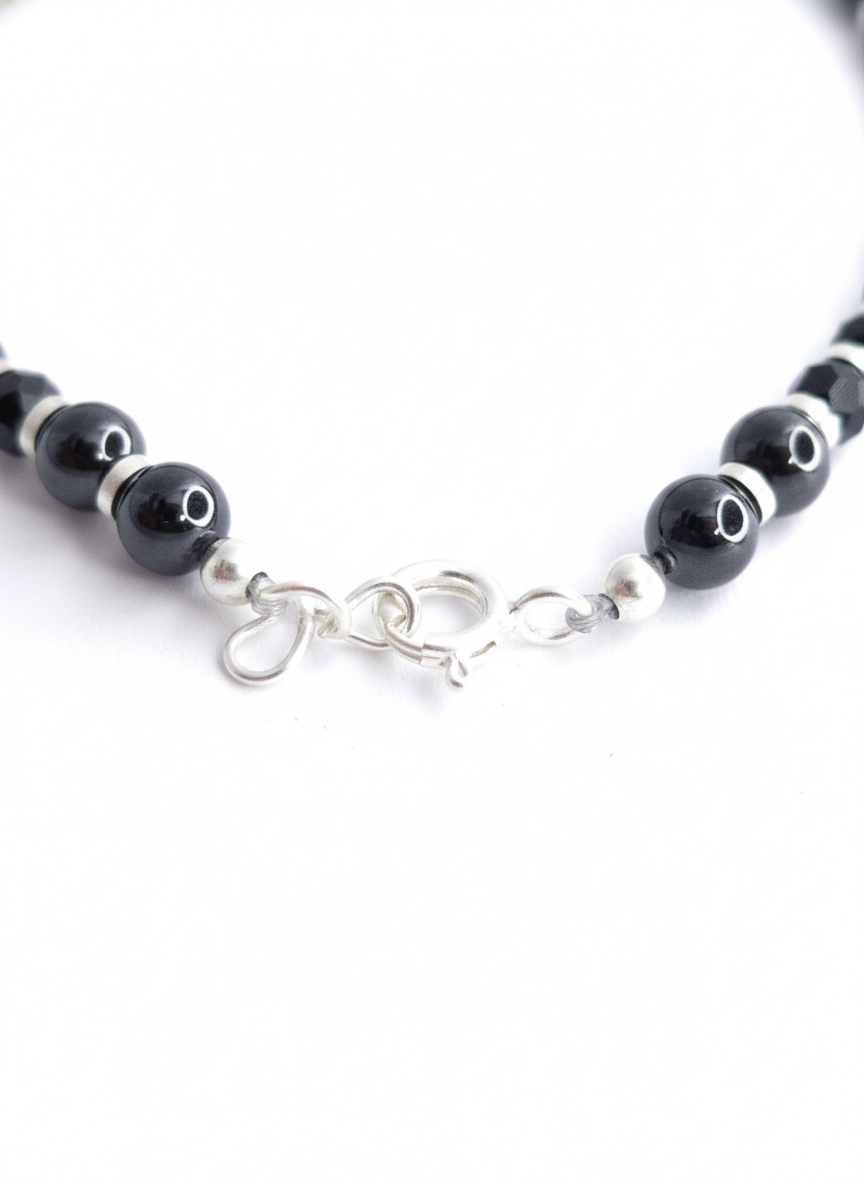 Black Guardlet faceted black stone bracelet with silver accents