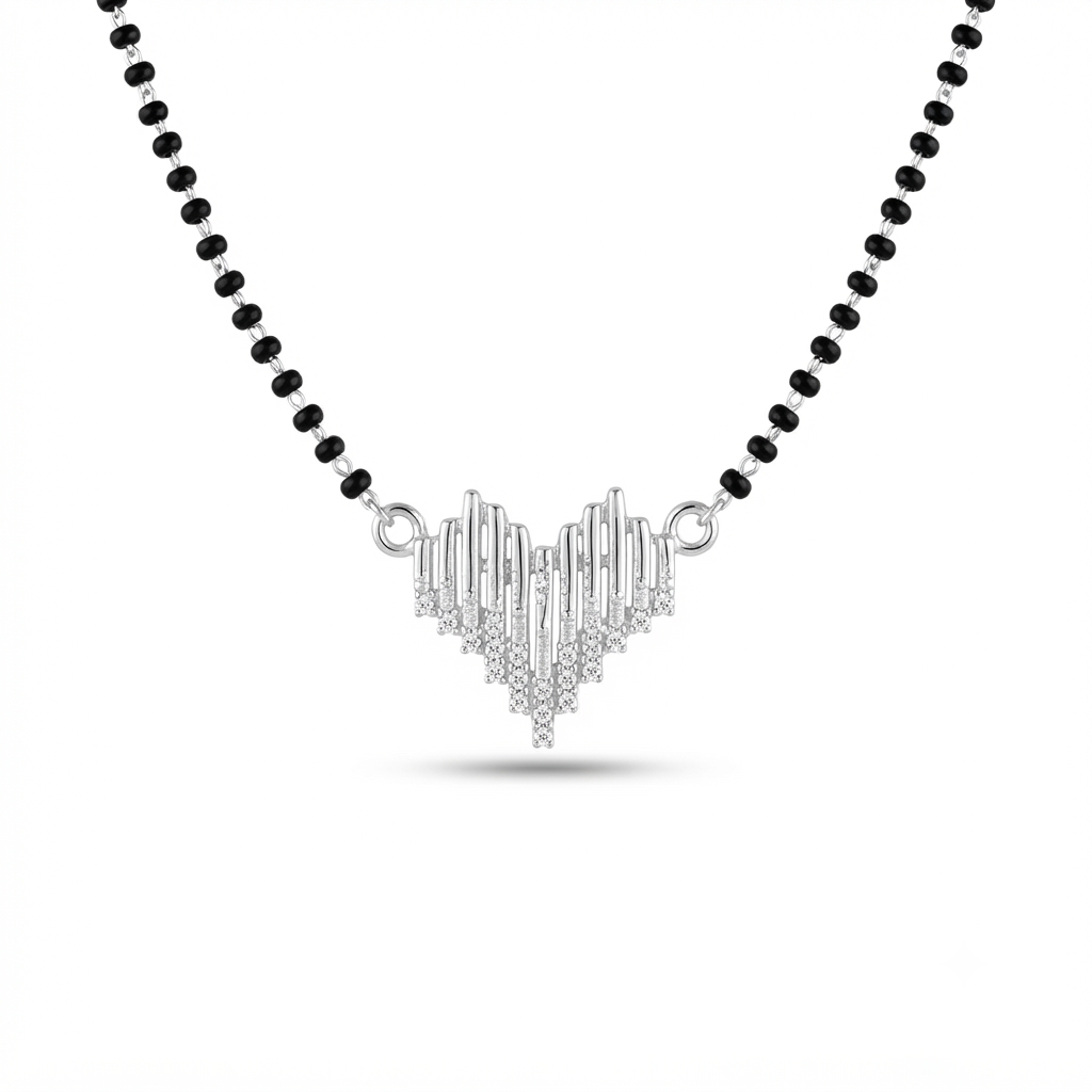 Detailed macro shot of the pave-set cubic zirconia stones on the modern silver heart mangalsutra pendant.