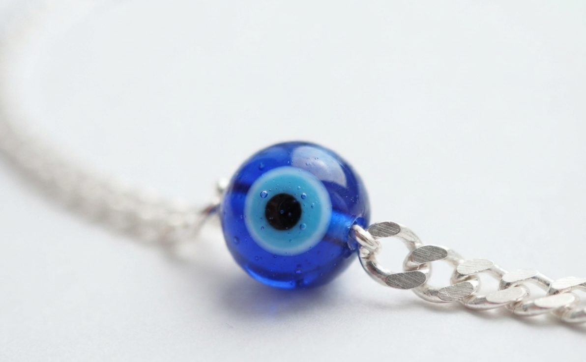 Madhisha Shield of Protection 925 sterling silver evil eye curb chain rakhi bracelet layout