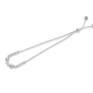 Side perspective of Madhisha 925 silver snake chain rakhi bracelet with graduating beads and slider clasp