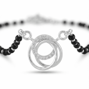 Close up of CZ pave studded interlocking rings pendant on 925 silver mangalsutra